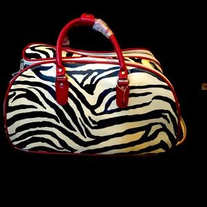 Zebra print carry on bag with roller